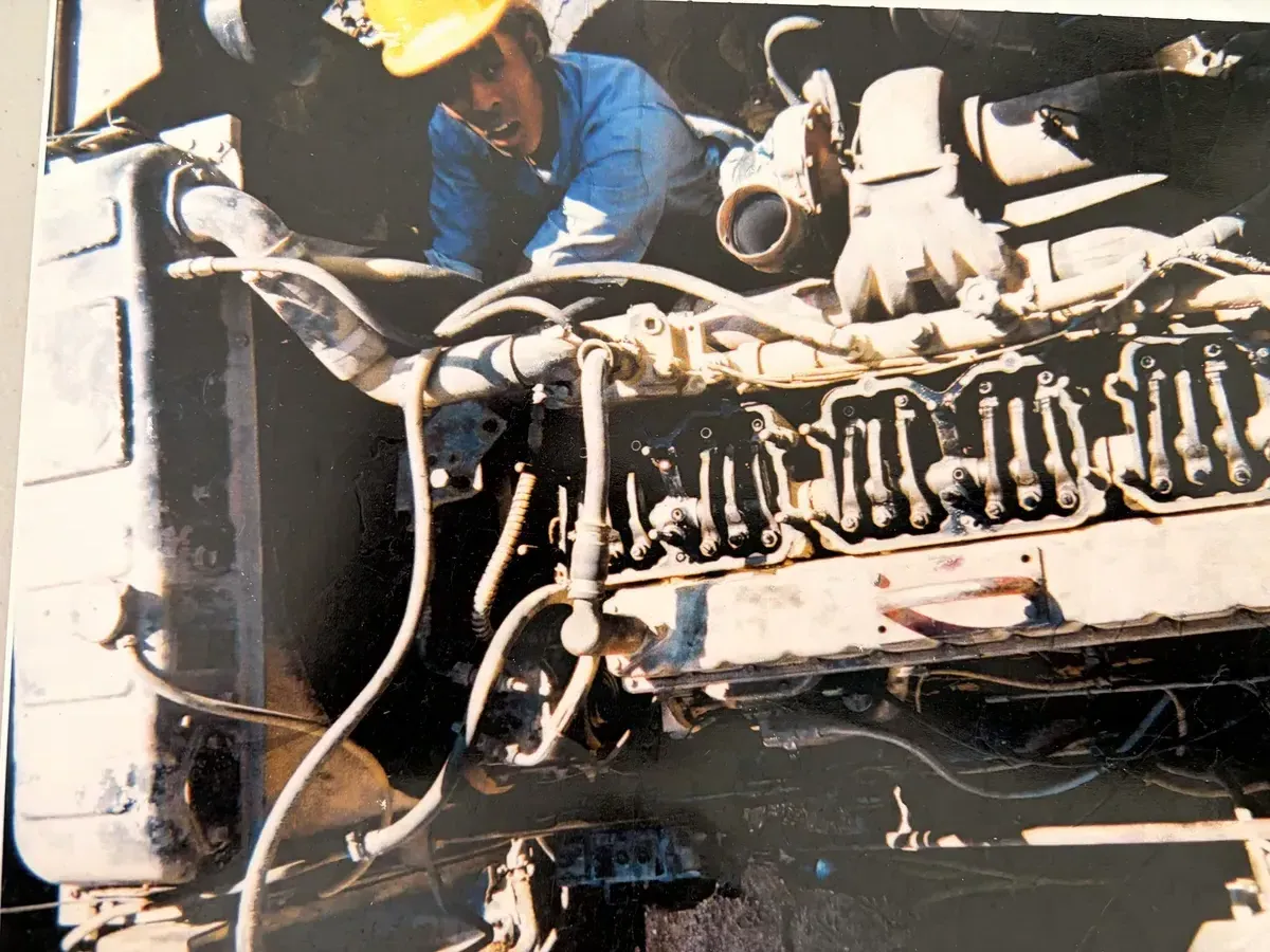 Commercial truck repair students learning engine maintenance